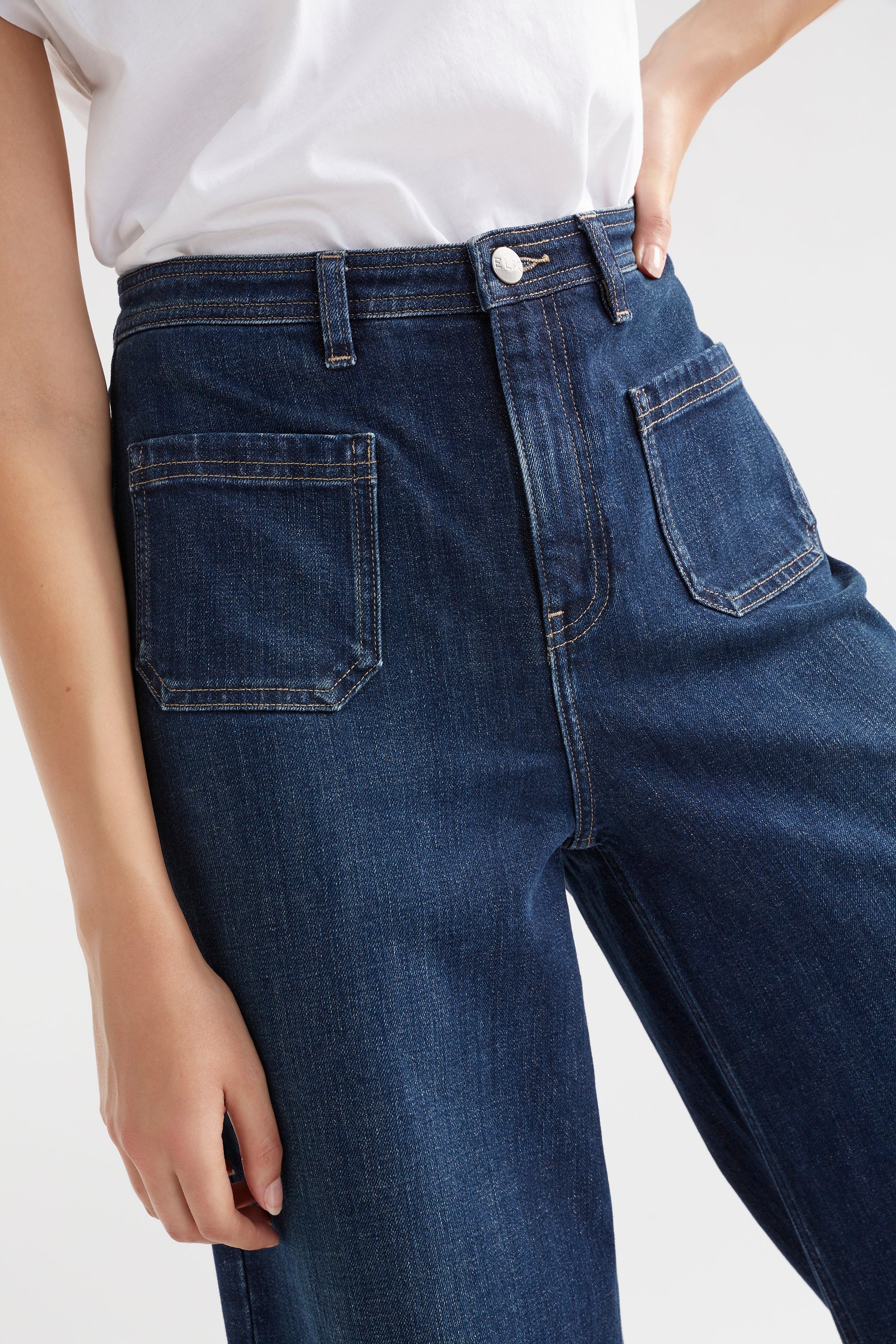 The Elk Sondern Jean is a wide leg and high-rise waist with two feature patch front pockets,